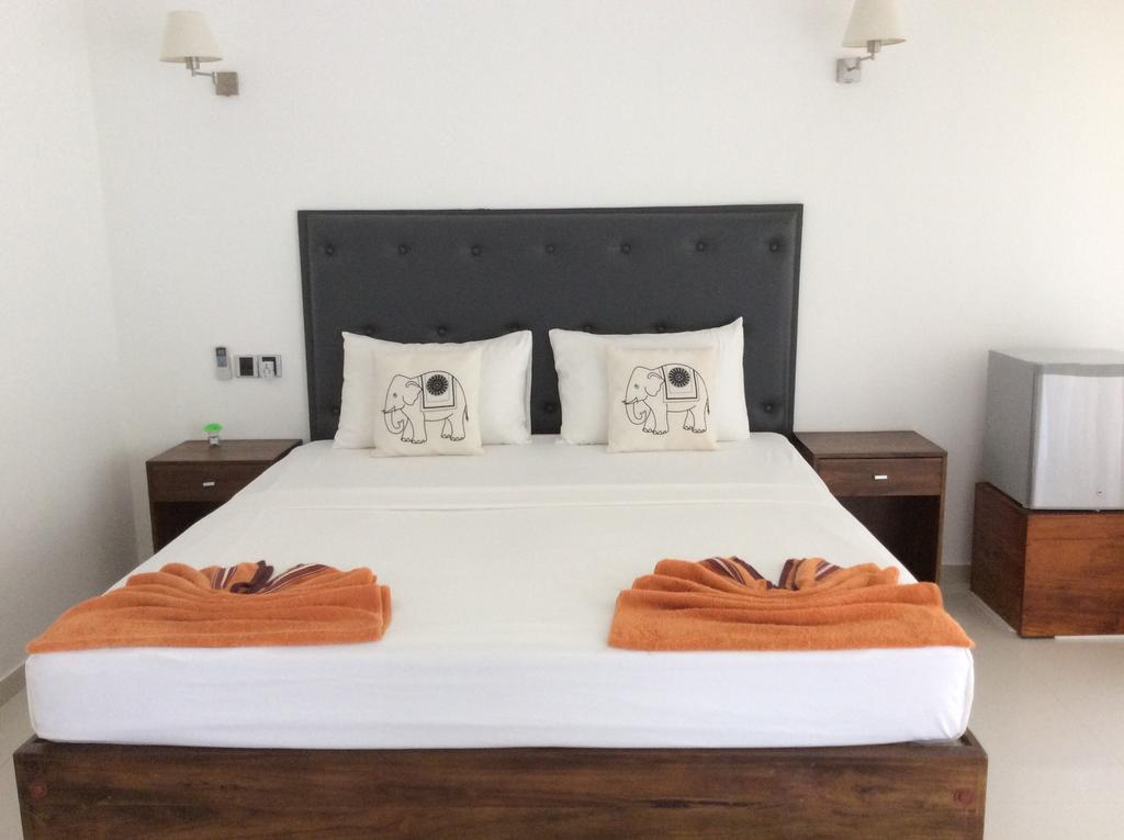 Lemazone Inn Mirissa Værelse billede